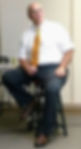 LEWIS SEATED PROFILE PHOTO.JPG