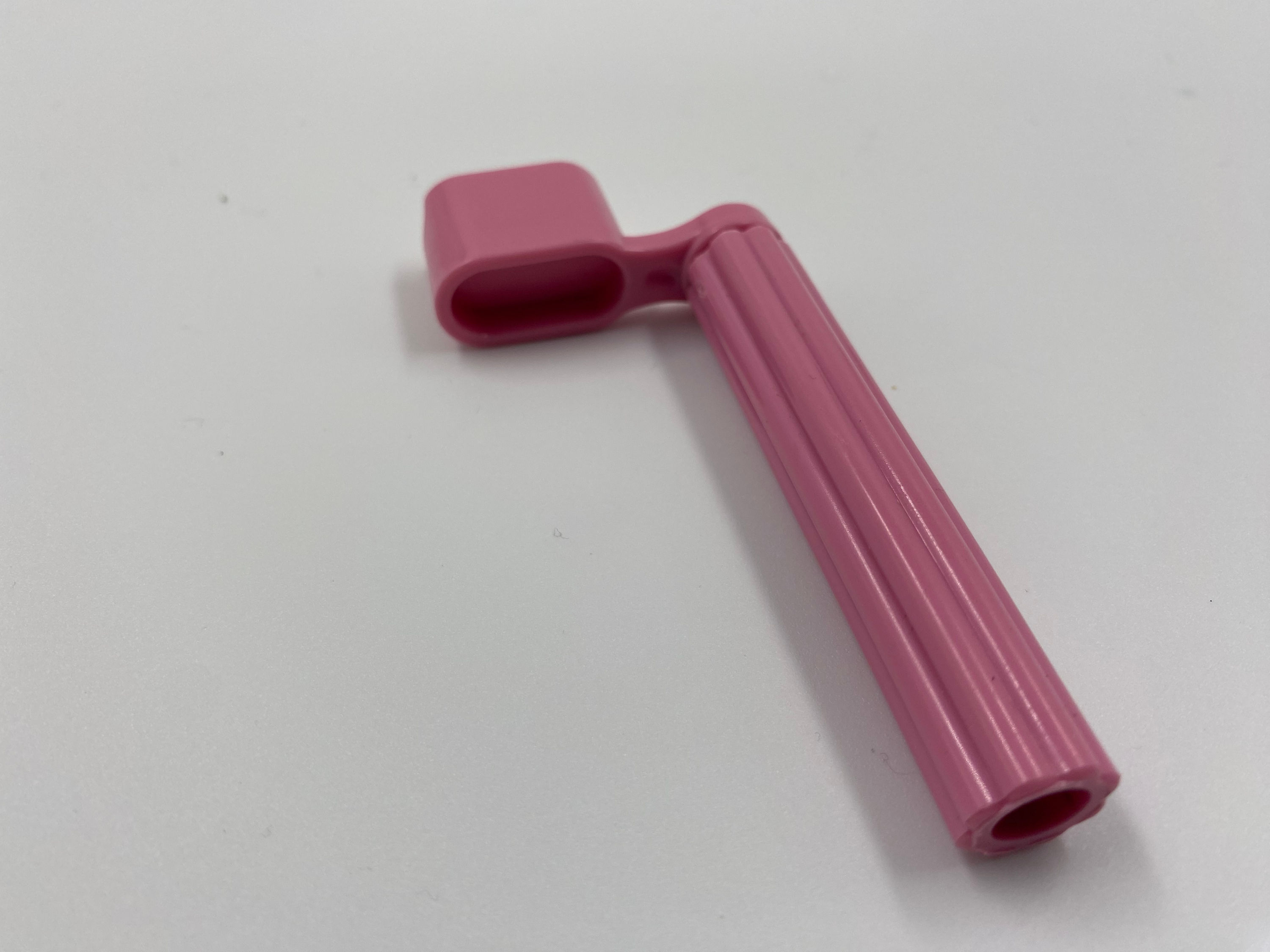 Guitar string winder is a string winder and bridge pin puller for guitar, bass.