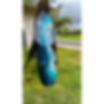 6" Red Tide Handcrafted Surfboard on Wood