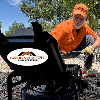 home-inspector-running-a-sewer-scope