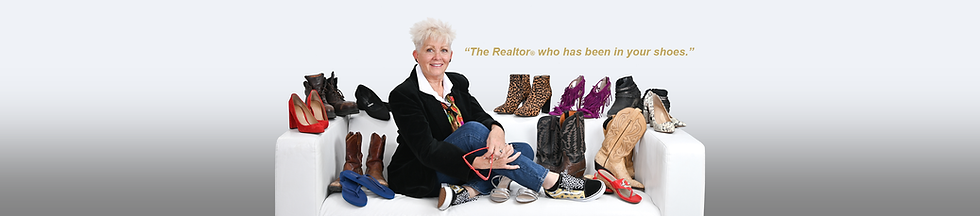 Jan Croft seated on a sofa with different shoes symbolizing experience and understanding in real estate