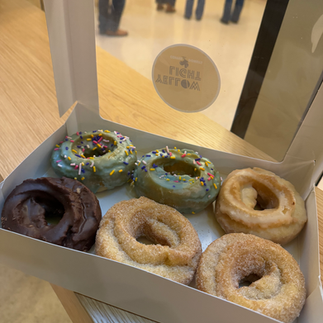 A half dozen donuts from Yellow Light in Michigan Central