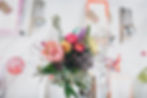 DIY wedding flowers containing south african protea, sunflowers, gypsophila, hollyhocks, dahlias