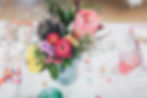 DIY wedding flowers containing south african protea, sunflowers, gypsophila, hollyhocks, dahlias