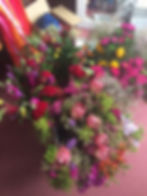 Cut flowers all ready to be arranged into DIY wedding bouquets
