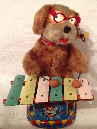 Close-up of a vintage mechanical toy with visible gears