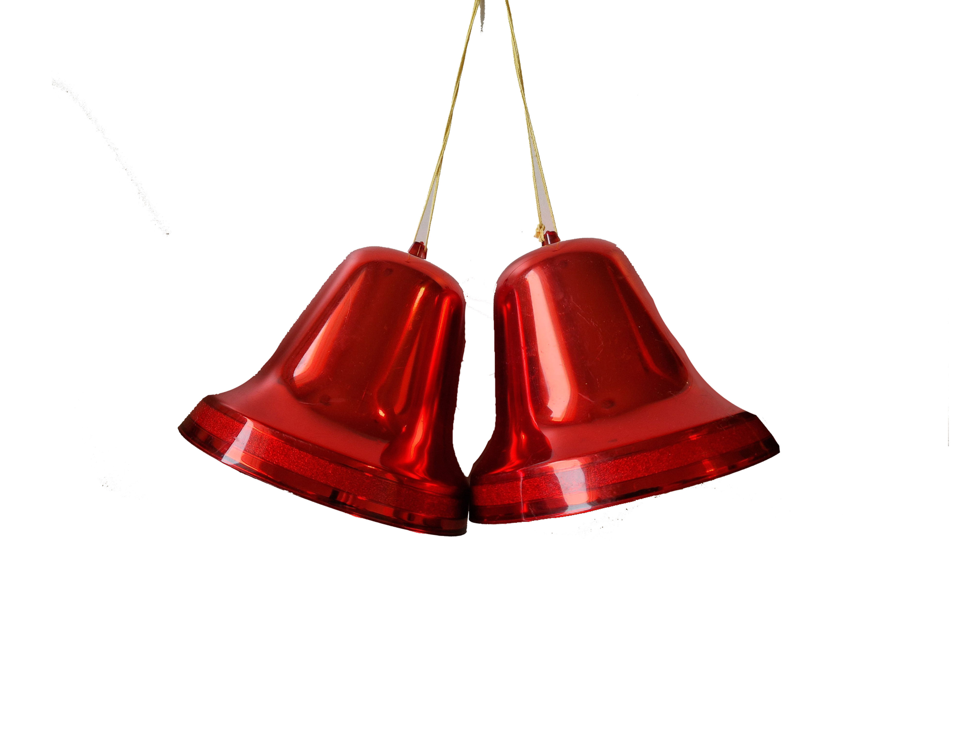 Iskokokoiset punaiset joulukellot.