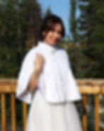Elegant, elbow length, bridal cape in white faux fur.