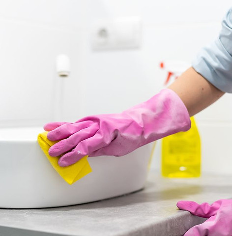 Cleaning Bathroom Sink.jpg