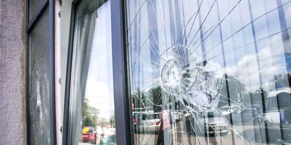 Calgary Window Hail Damage.jpg