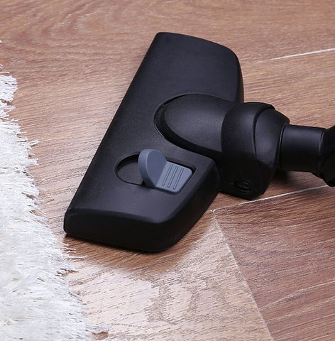 Vacuuming hardwood floors.jpg