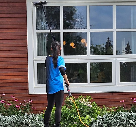 Lady soft washing window