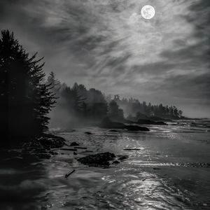 Black and White full moon over Long Beach, Vancouver Island.