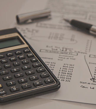 Calculator, pen, document with numbers, "Start at Monday", "Can we do this?"