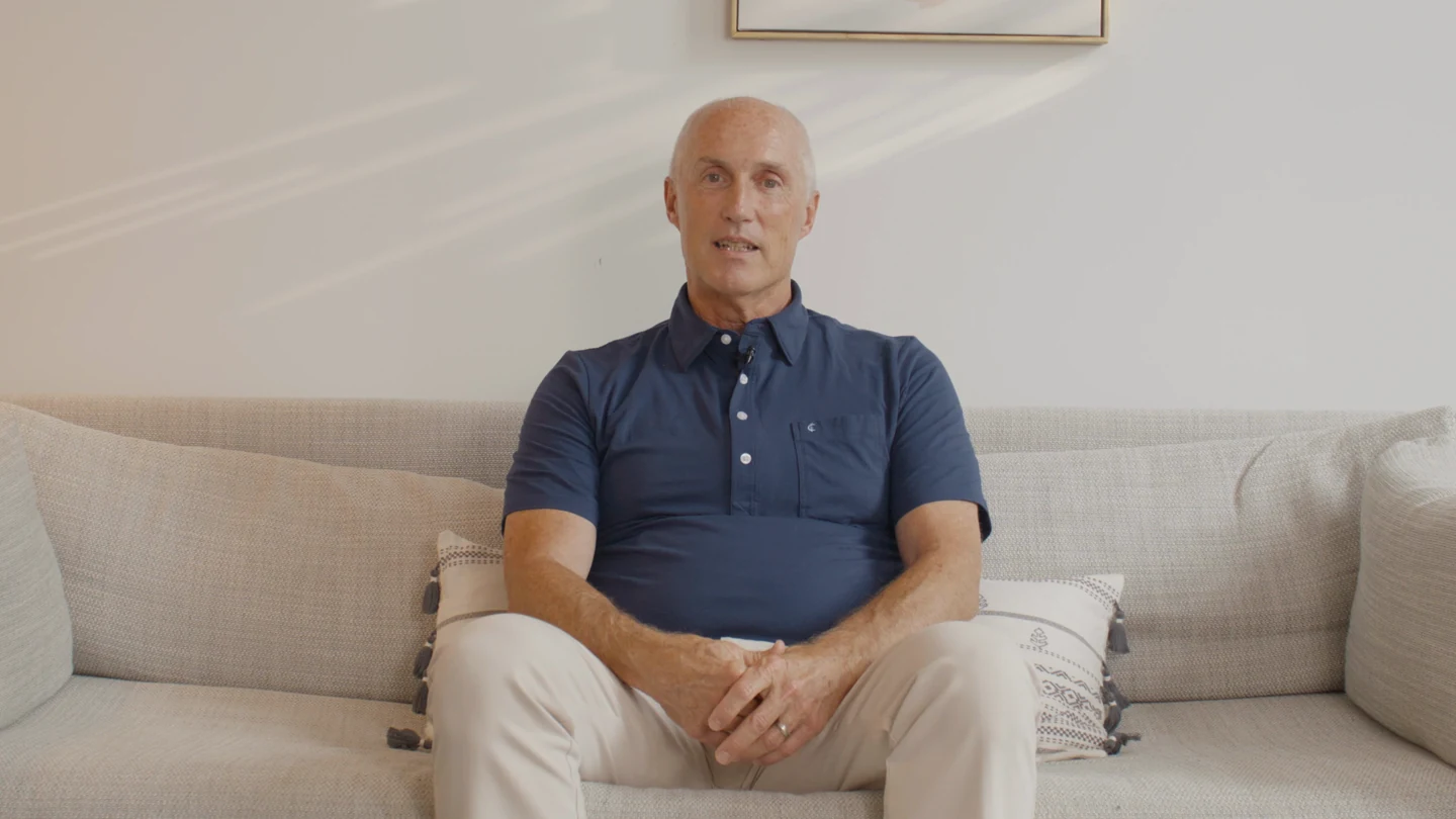 Jim Purcell seated on a sofa during his Radical Mentoring interview