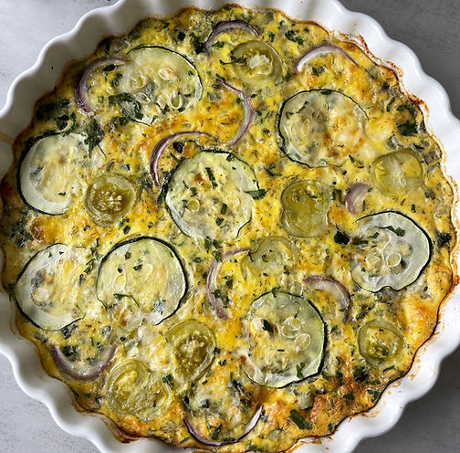 A light and elegant Summer Squash Frittata made with Swiss chard, herbs, and cottage cheese, finished with Dijon crème fraîche—perfect for brunch or a simple summer dinner.