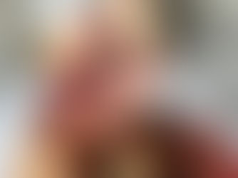 Cranberry Protein Pancakes stacked on a golden fork