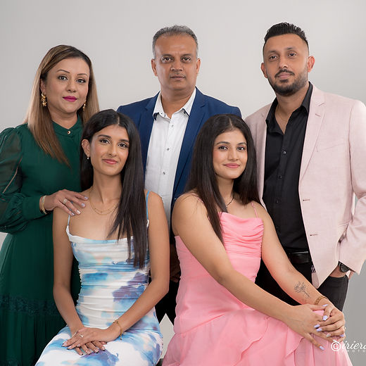 Five family members posing together during a Studio Portrait Session