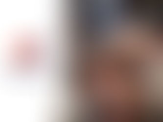 Homeowners reviewing a residential heating system during winter HVAC service in Quincy Massachusetts