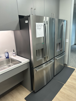 two fridges in an office kitchen