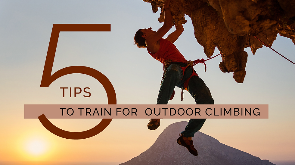 Rock climber in a red top hangs from a cave ceiling at sunset, overlooking a tranquil ocean and island. Warm, serene atmosphere.