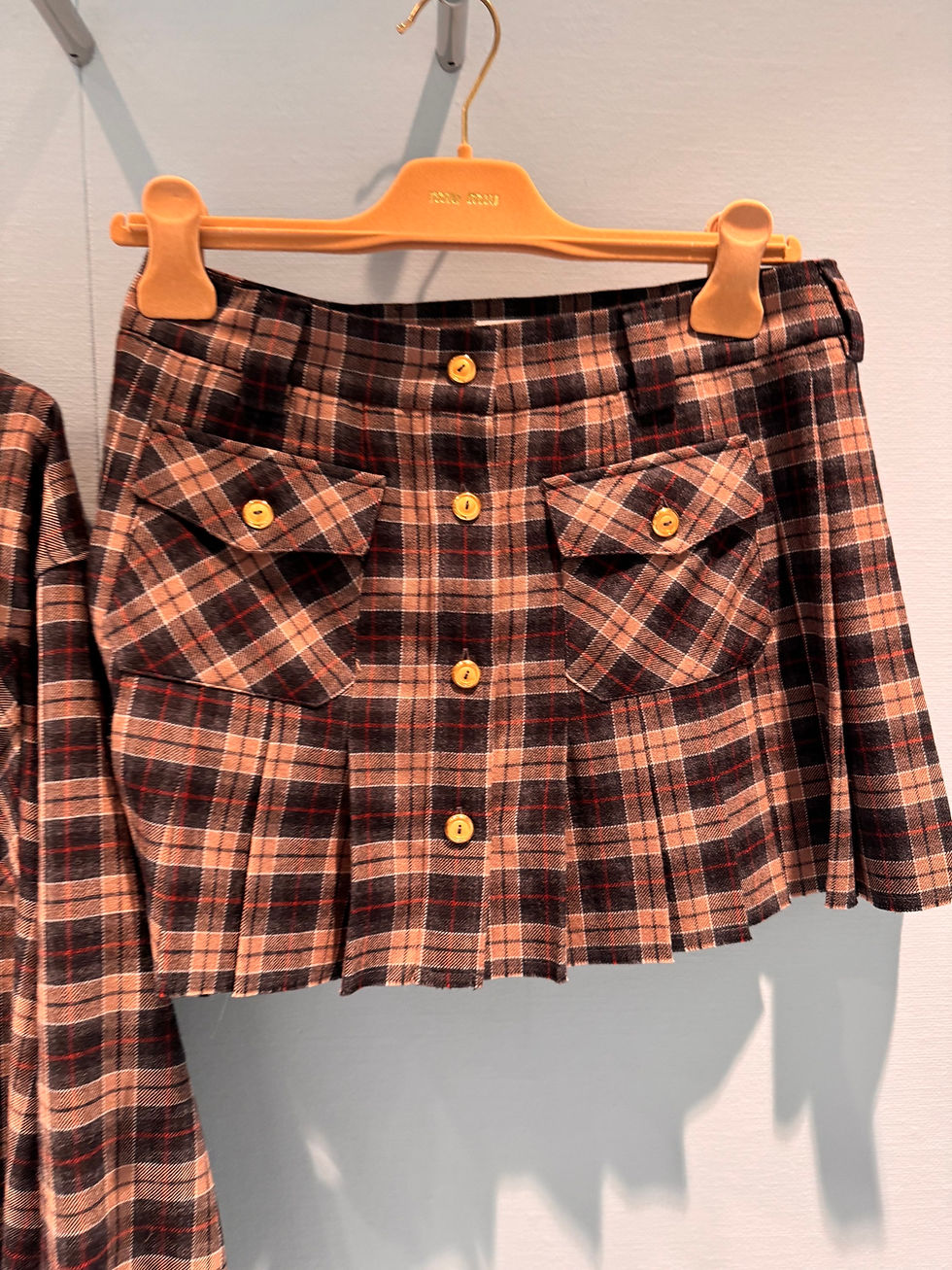 Thumbnail: MIU MIU Pleated Tartan Miniskirt | Camel brown | Spring 2025