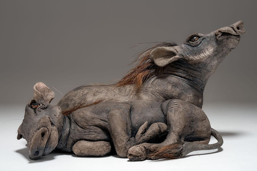 Nick Mackman SWLA sculpture of warthogs. Photo courtesy of SWLA.