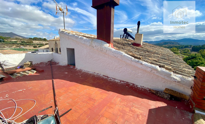 Second rooftop terrace view overlooking mountains in Vélez-Blanco, Almería, Andalusia.