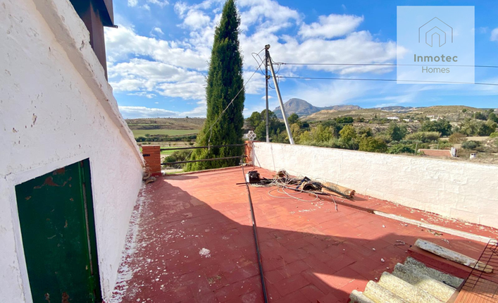 Rooftop terrace with countryside views in Vélez-Blanco, Almería, Andalusia, Spain.