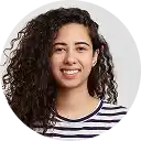 Smiling young woman with curly hair