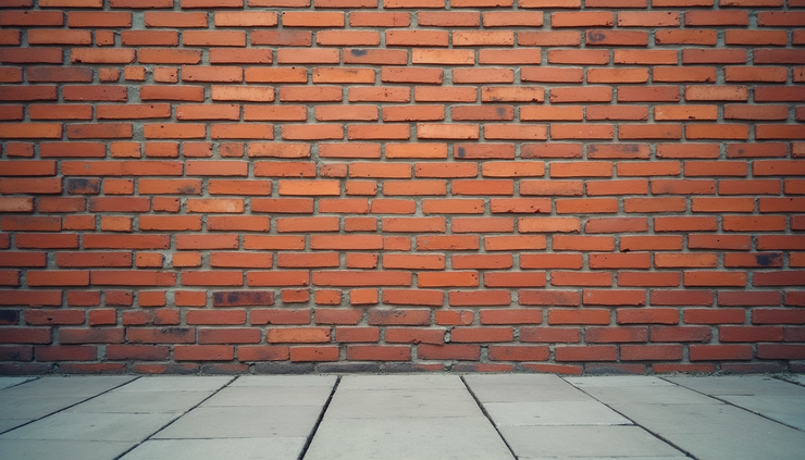 Eye-level view of a brick wall with clean, uniform bricks and mortar