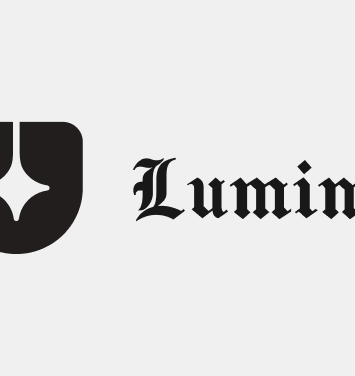 Lumina logo with a shield emblem on a black background