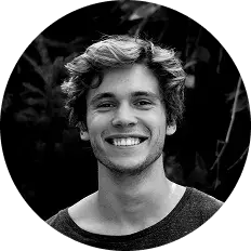 Smiling young man with fair hair in monochrome. Cleanzly