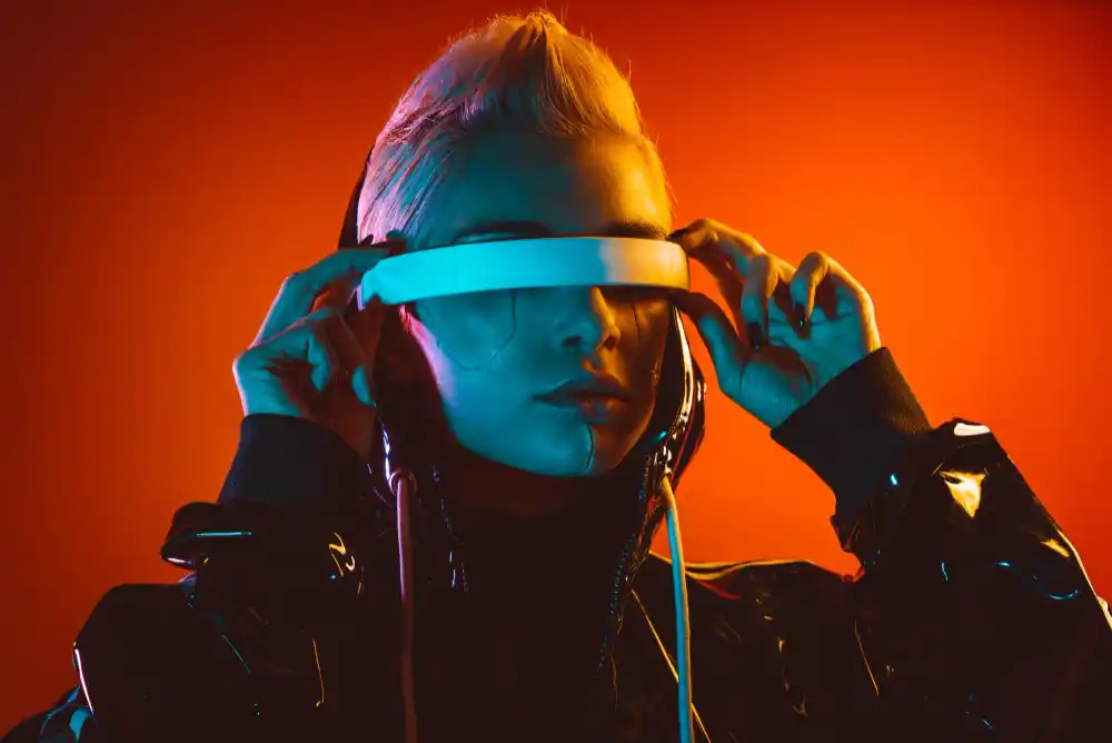 Person wearing futuristic VR headset with red and blue neon lights.