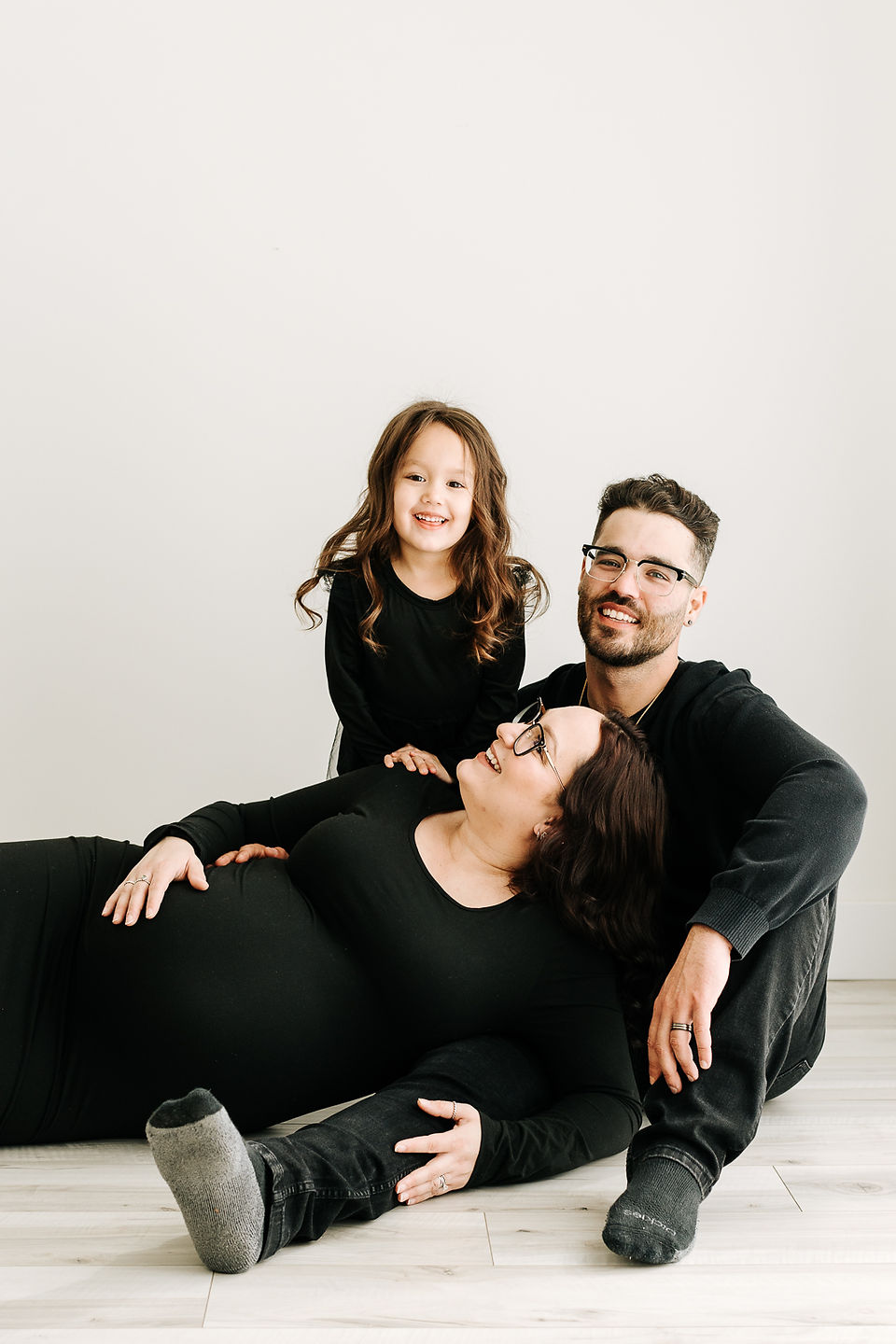 Studio maternity session in Guelph, Ontario with mom, dad, and daughter