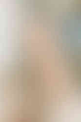 Emerson during his first birthday cake smash at Elle Chic Photography Studio, Guelph, wearing a neutral studio wardrobe outfit.