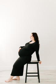 Studio maternity session in Guelph, Ontario highlighting mom and her baby bump.