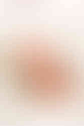 Newborn baby wrapped in a swaddle during a studio newborn photography session