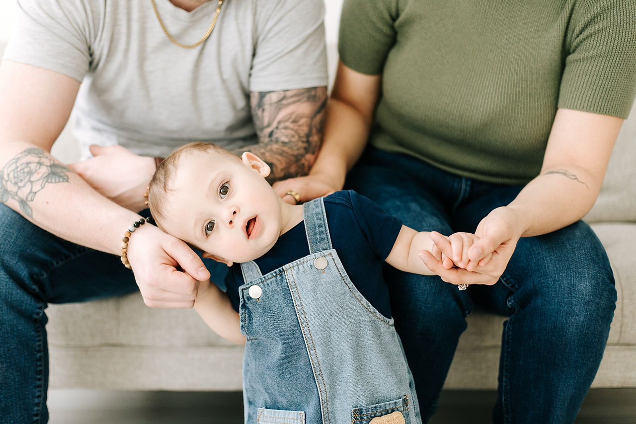 Family of three captured during a From Maternity to Milestones milestone session in Guelph, Ontario