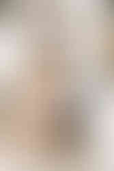 Family with newborn baby in a natural home setting during an in-home newborn session in Guelph, Ontario