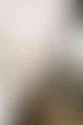 In-home newborn session in a kitchen space capturing everyday moments in Guelph, Ontario