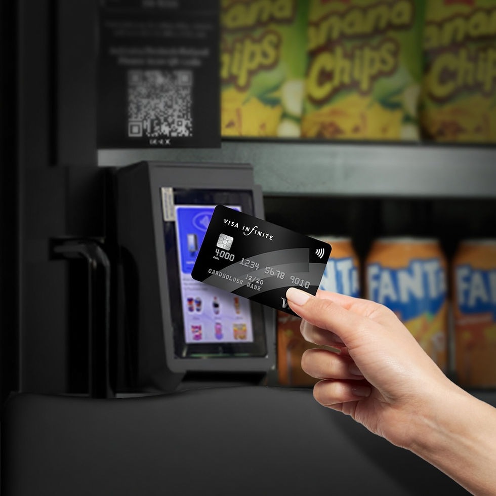 A customer making a secure contactless credit card payment at a smart retail kiosk checkout terminal.