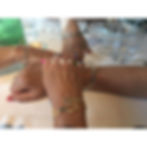 four friends celebrating special birthday with embroidery cuffs