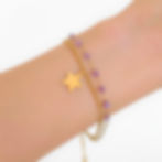 Bracelet double en acier inoxydable et perles violettes. Breloque étoile
