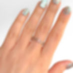 Bague réglable en acier inoxydable argenté.