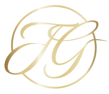 Goldenes TG-Logo in Schreibschrift in einem Kreis