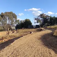 Contoured access track design and terrace construction by Doc Spice Permaculture.