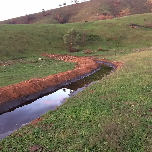 Contour swale designed by David Spicer moving runoff water from valley to ridge while trapping post-bushfire sediment