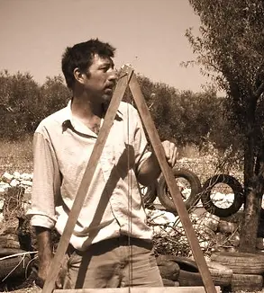 David Spicer teaching A-frame surveying techniques on a Permaculture Design Course in Palestine in 2010