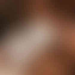 Family reading a book about a new baby to their toddler